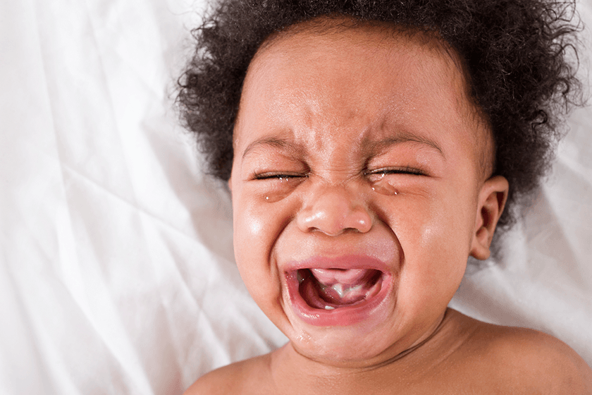 Newborn baby crying with different facial expressions